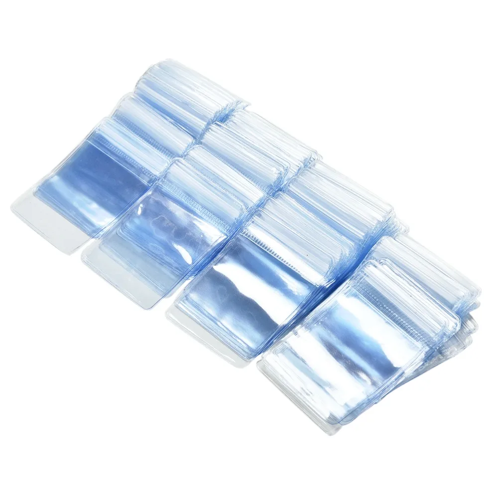 100 kozarcev Ovojnice za Embalažo Bag 70 x 50 mm Jasno PVC Plastike Kovanec Vrečko Primeru Torbica za Shranjevanje